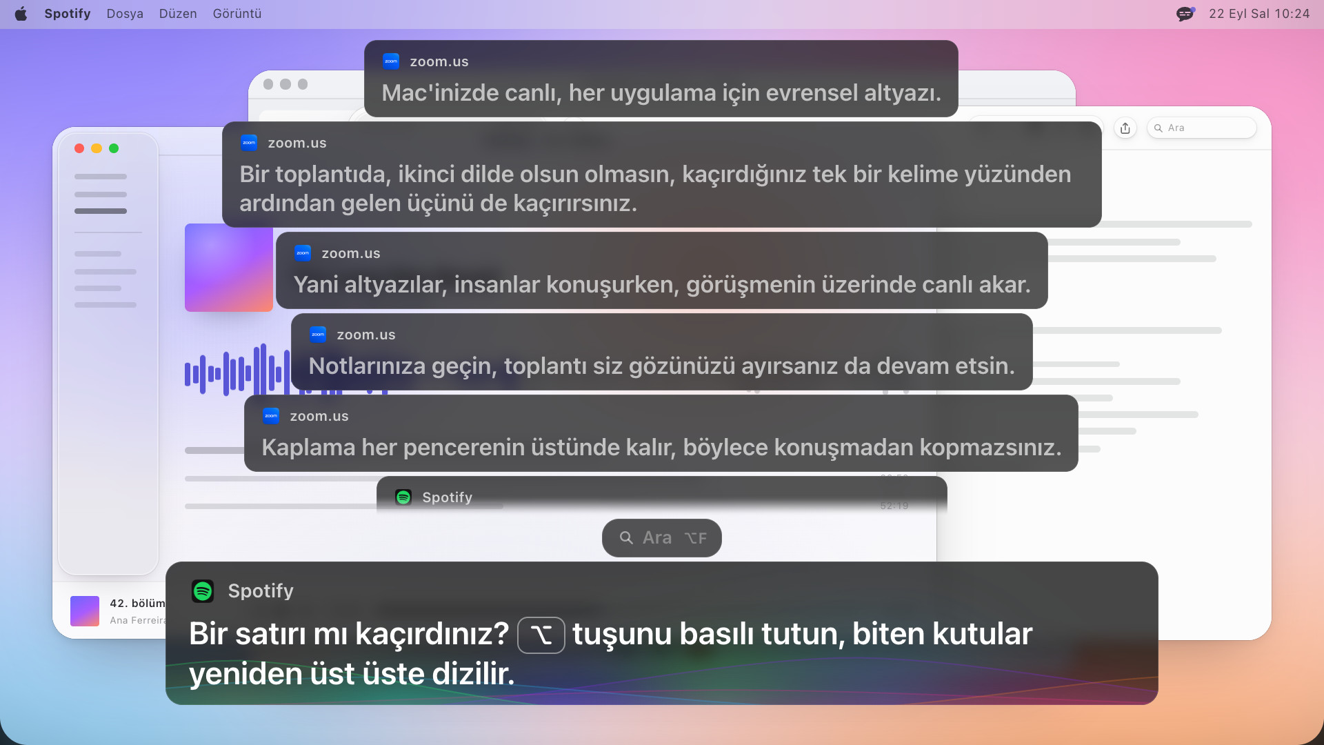 Güncel kutunun üstüne dizilmiş dört önceki altyazı kutusu, en üstteki silikleşiyor; en yenisinde İngilizce şu yazıyor: Missed a line? Hold Option to rewind: every caption that closed stacks back up